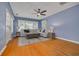 Bright living room featuring hardwood floors, a comfortable seating area, and ample natural light at 505 27Th N Ave, St Petersburg, FL 33704
