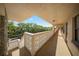 Spacious balcony with decorative concrete railing, perfect for enjoying the surrounding lush greenery views at 5080 Locust Ne St # 321, St Petersburg, FL 33703
