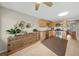 Spacious kitchen boasting stainless steel appliances and dark countertops complemented by natural wood cabinetry at 5080 Locust Ne St # 321, St Petersburg, FL 33703