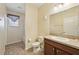 Cozy bathroom featuring a single sink vanity, tile flooring, and a shower-tub combination at 627 Washita Stone Dr, Ruskin, FL 33570
