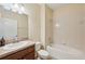 Clean bathroom with a vanity sink, a shower-tub combination, and neutral color scheme at 627 Washita Stone Dr, Ruskin, FL 33570