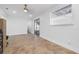 Versatile bonus room featuring light-colored tiled floors, large windows, and lots of space at 6414 Larmon St, Tampa, FL 33634