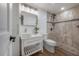 Charming bathroom with stylish vanity, modern fixtures, and walk-in shower at 7006 N Duncan Ave, Tampa, FL 33604