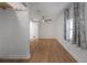 Spacious bedroom with wood flooring, ample natural light, and a ceiling fan, perfect for relaxation and comfort at 7006 N Duncan Ave, Tampa, FL 33604
