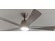 Contemporary ceiling fan with integrated light fixture and sleek, silver blades at 7006 N Duncan Ave, Tampa, FL 33604