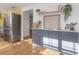Kitchen featuring gray cabinets with white countertops and stainless steel refrigerator at 7006 N Duncan Ave, Tampa, FL 33604
