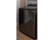 Close-up view of a modern black washer in a laundry area, showcasing its sleek design and functionality at 7006 N Duncan Ave, Tampa, FL 33604