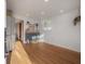 Bright, airy living room with hardwood floors and ample natural light at 7006 N Duncan Ave, Tampa, FL 33604
