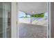 Outdoor patio features a paved area with a covered section, perfect for relaxing or entertaining guests at 7006 N Duncan Ave, Tampa, FL 33604