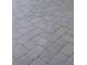 A closer view of the paved patio area, showcasing the pattern and texture of the stones at 7006 N Duncan Ave, Tampa, FL 33604