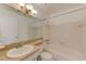 Clean bathroom featuring a sink, vanity, mirror and bathtub at 7081 Lafayette N, Pinellas Park, FL 33781