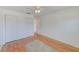 Bedroom featuring closet and doorway with access to other areas at 7081 Lafayette N, Pinellas Park, FL 33781