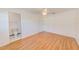 Spacious bedroom features wood floors and easy access to the en-suite bathroom at 7081 Lafayette N, Pinellas Park, FL 33781