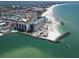 An aerial shot of a luxury condo community with private beach access and waterfront views at 7100 Sunset Way # 303, St Pete Beach, FL 33706