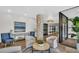 Community lobby with stone column, contemporary furniture, and tiled floors at 7100 Sunset Way # 303, St Pete Beach, FL 33706