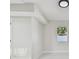 Bedroom featuring neutral walls, modern lighting and an exterior window at 7210 8Th N Ave, St Petersburg, FL 33710