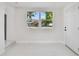 Inviting room featuring large windows and a welcoming entrance at 7210 8Th N Ave, St Petersburg, FL 33710