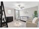 Bright Bedroom with a crib, changing table, and comfortable chair, creating a cozy atmosphere at 7331 Canterbury Bells Ct, Tampa, FL 33619