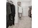 Walk-in closet provides ample space for storage and organization of clothes and accessories at 7331 Canterbury Bells Ct, Tampa, FL 33619