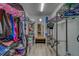 Walk-in closet with organized shelving, racks and ample storage space for clothes, shoes, and accessories at 9802 Eden Ave, Hudson, FL 34667