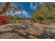 Large lot with driveway, fencing, and large shade trees at 9802 Eden Ave, Hudson, FL 34667