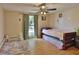Bedroom featuring neutral paint, great window lighting, and multiple twin beds at 9836 Rainbow Ln, Port Richey, FL 34668