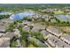 Stunning aerial view of the community showcasing lush landscaping at 10144 Arbor Run Dr # 157, Tampa, FL 33647