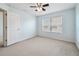 Light-filled bedroom with a ceiling fan and a window, offering a comfortable and inviting space at 10144 Arbor Run Dr # 157, Tampa, FL 33647