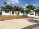 Charming single-story home with freshly painted exterior and well-manicured landscaping at 11210 Yewtree Ave, Port Richey, FL 34668