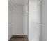 The closet offers ample storage with rods and wire shelving at 11309 Tulane St, New Port Richey, FL 34654