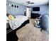 Comfortable bedroom with a ceiling fan and plenty of space at 11936 Sand Myrtle Rd, Riverview, FL 33579