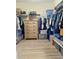 Spacious walk-in closet with built-in shelving and hanging racks at 11936 Sand Myrtle Rd, Riverview, FL 33579