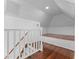 Finished attic space showcasing wood floors, and natural lighting at 1330 Cherry Ne St, St Petersburg, FL 33701