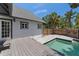Backyard pool featuring a deck and privacy fence at 1330 Cherry Ne St, St Petersburg, FL 33701