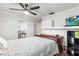 This bedroom has a ceiling fan and built in closets at 13841 89Th Ave, Seminole, FL 33776