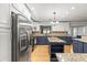 Spacious kitchen with stainless steel appliances, granite countertops, and ample cabinetry at 13841 89Th Ave, Seminole, FL 33776