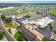 Community center with ample parking and amenities from above showcasing outdoor activities at 1402 Bluewater Dr, Sun City Center, FL 33573