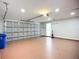 Attached two car garage with sealed floor and garage door opener at 1402 Bluewater Dr, Sun City Center, FL 33573
