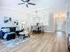 Open living area showcases modern decor, laminate floors, and natural light at 1402 Bluewater Dr, Sun City Center, FL 33573