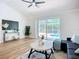 Living room overlooking the pool and well lit by natural light at 1402 Bluewater Dr, Sun City Center, FL 33573