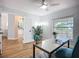Inviting home office with a view of the kitchen and plenty of natural light at 1402 Bluewater Dr, Sun City Center, FL 33573