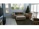 Comfortable living room features ample light and stylish decor at 1803 Longview Ln, Tarpon Springs, FL 34689