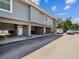 Waterfront condominium with private docks and staircases, set on a canal with access to tranquil waters and blue skies at 200 Meres Blvd # 26, Tarpon Springs, FL 34689