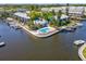 Waterfront home featuring a private backyard pool surrounded by lush landscaping at 200 Meres Blvd # 26, Tarpon Springs, FL 34689