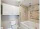 Beautiful bathroom featuring a soaking tub, tiled shower, and built-in storage at 200 Meres Blvd # 26, Tarpon Springs, FL 34689