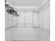A walk-in closet with ample storage space and built in organizers at 200 Meres Blvd # 26, Tarpon Springs, FL 34689