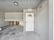 Covered entrance featuring a white front door and a 'Welcome' sign at 200 Meres Blvd # 26, Tarpon Springs, FL 34689