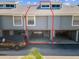 Townhouse highlighted, featuring covered parking and easy access to individual units at 200 Meres Blvd # 26, Tarpon Springs, FL 34689