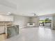 Open living space with a view of the water, tile floors, and built-in shelving for a modern and comfortable setting at 200 Meres Blvd # 26, Tarpon Springs, FL 34689
