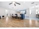 Spacious kitchen with an island, bar stool seating, and a view to the front door at 2244 Glenmoor N Rd, Clearwater, FL 33764